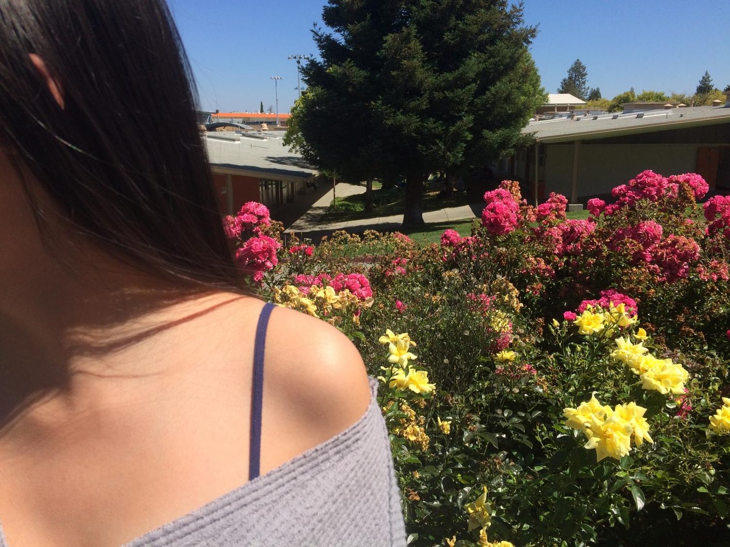 Although Woodside's dress code bans visible undershirt straps, off-the-shoulder shirts are common among students.