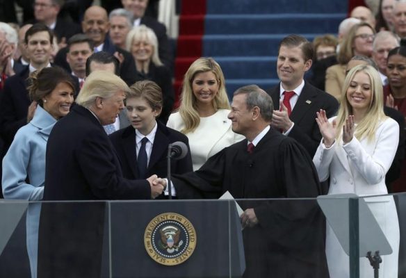 U.S.+President+Donald+Trump+shakes+hands+with+U.S.+Supreme+Court+Chief+Justice+John+Roberts+%28R%29+after+being+sworn+in+as+president+with+his+wife+Melania%2C+and+children+Barron%2C+Donald%2C+Ivanka+and+Tiffany+at+his+side+during+inauguration+ceremonies+at+the+Capitol+in+Washington%2C+U.S.%2C++January+20%2C+2017.+REUTERS%2FCarlos+Barria