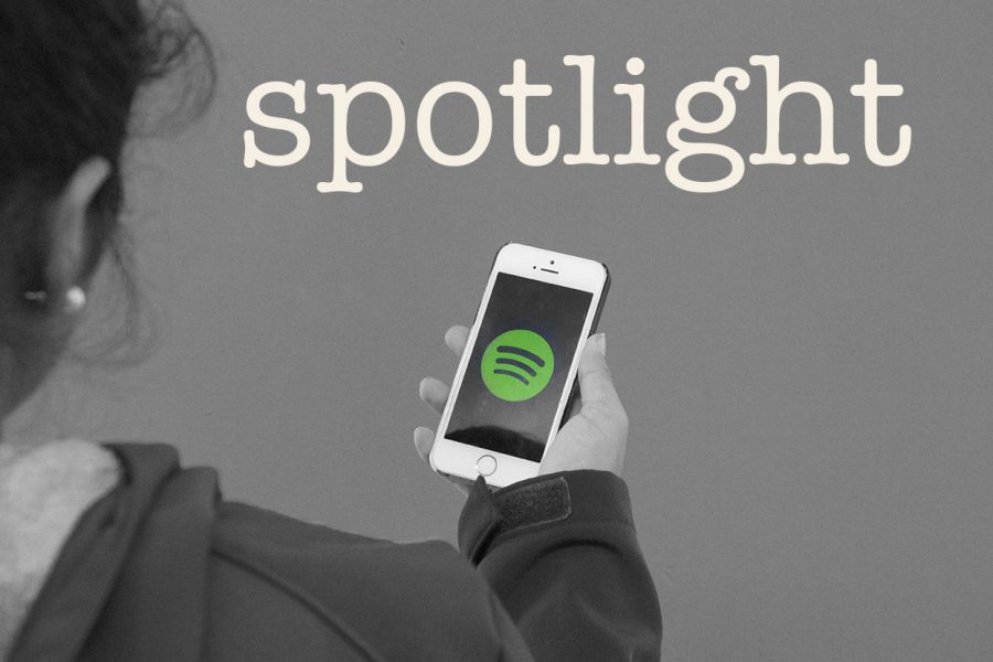 A student opens Spotify to use Spotlight, the popular music app’s new feature that displays unique visuals as users listen to podcasts and other audio.