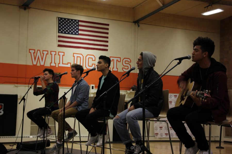 The boy band In Real Life performs live at Woodside High School on March 13, 2018.