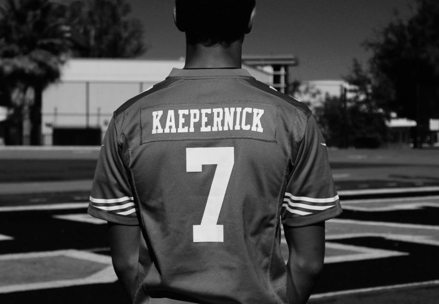 Tommy Williams in Kaepernicks 49ers jersey.