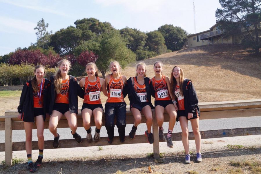 The varsity girls celebrate a great end to their season after running at Central Coast Sectionals Championship meet