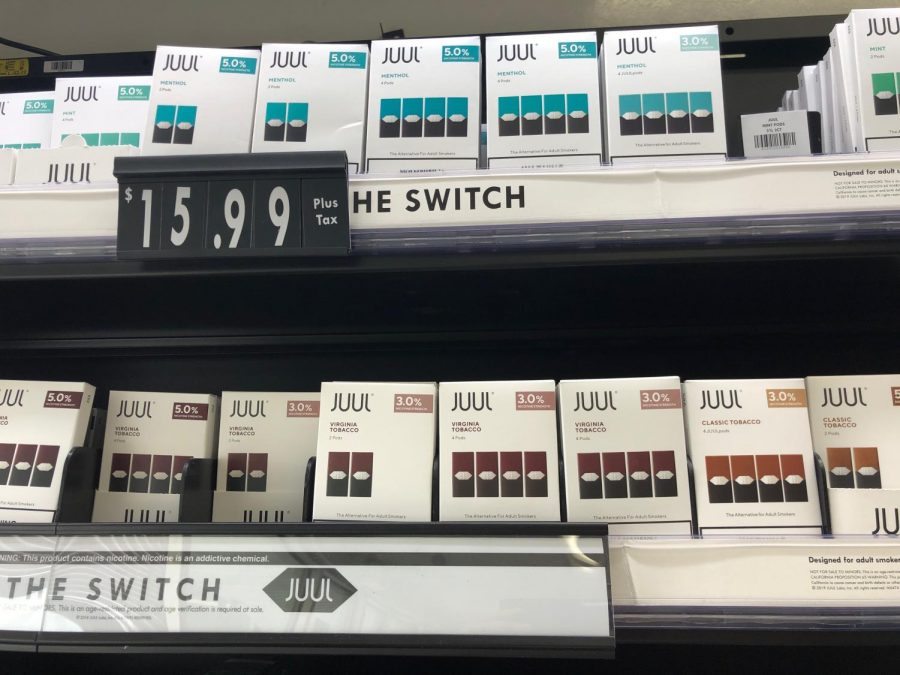 A variety of JUUL products for sale at a local gas station