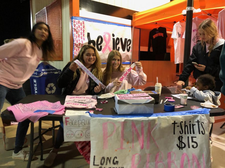 The Pink Ribbon Club sold shirts at a stand during the game.