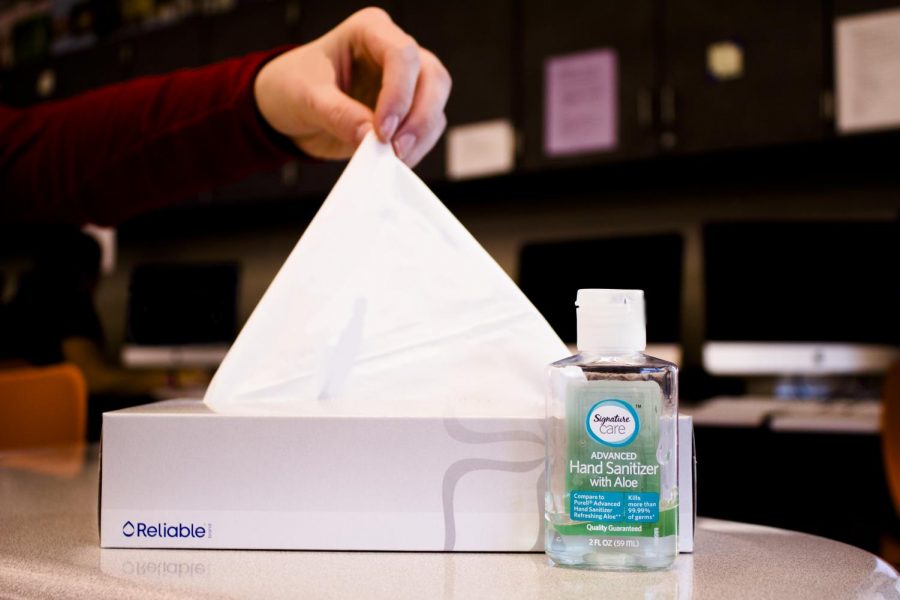Students+reach+for+tissues+and+hand+sanitizer+as+flu+season+approaches.