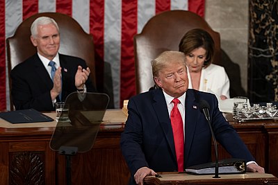 Trump delivers his State of the Union address while Vice President Mike Pence and House Speaker Nancy Pelosi listen behind him.