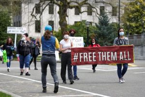 People held protests demanding that prisoners be freed amid the spread of the coronavirus.