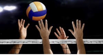 Hands reach out to touch a volleyball first over a net.