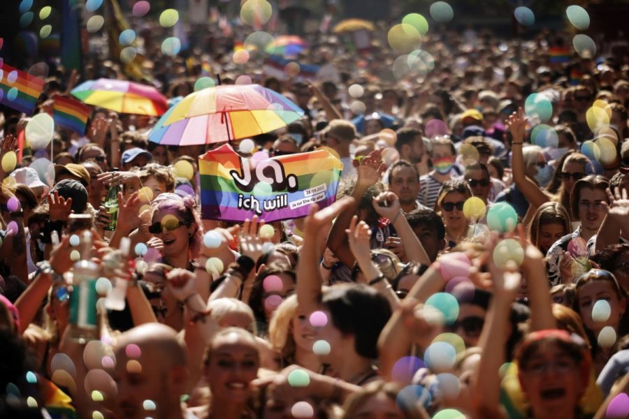 People in Zurich, Switzerland advocate for LGBTQIA rights in a Pride parade.
