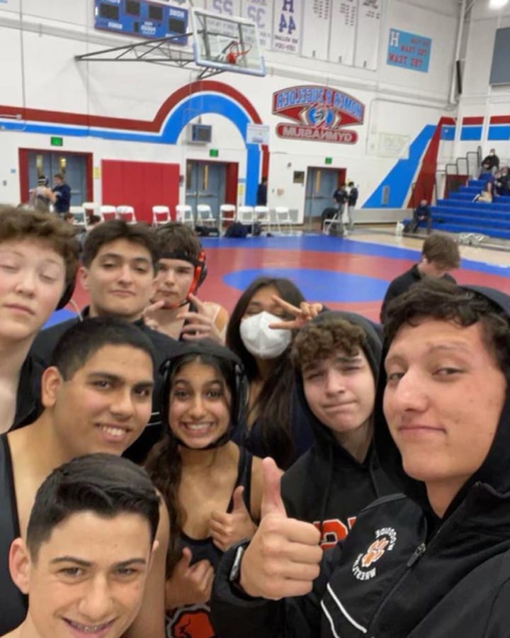 The Woodside Wrestling team takes a selfie after their first dual meet on Thursday. Woodside lost to Carlmont but beat Hillsdale on criteria