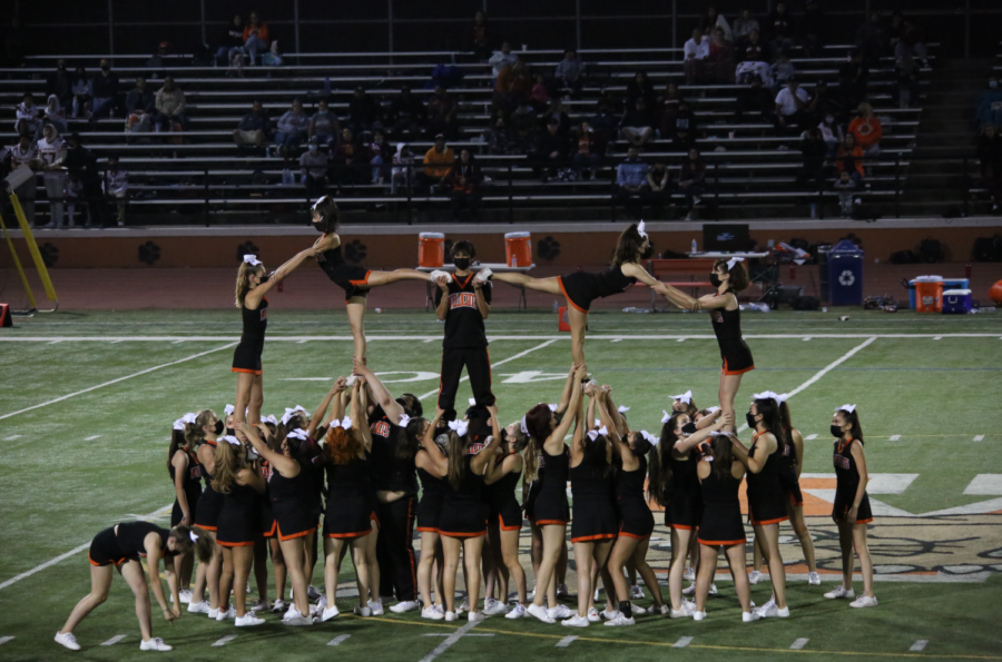 Cheerleading team performs at football, basketball, rallies, and more.