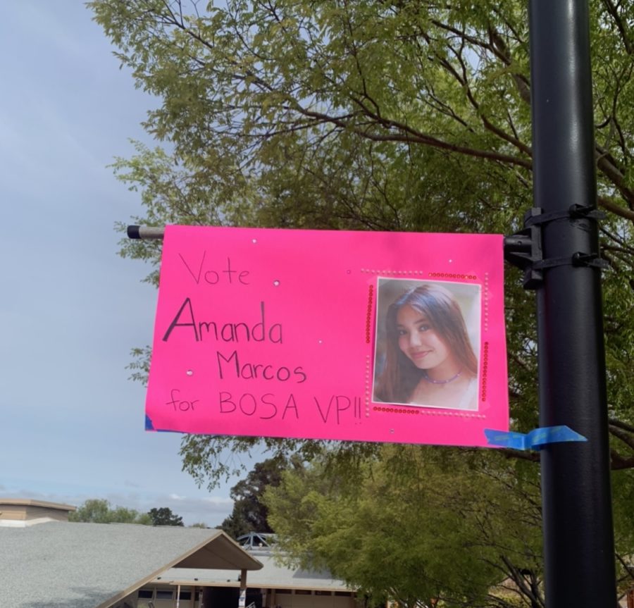 Marcos has set up numerous posters circling Woodside's campus.
