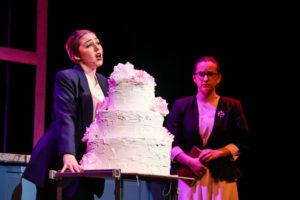 Kathrine (Brynn Ayoob) and Torrey (Chloe Montgomery) singing near a large cake during what you got during Woodsides production of Freaky Friday on Sunday, March 13, 2022. (All photo captions by Spencer Calsing Lyons) 
