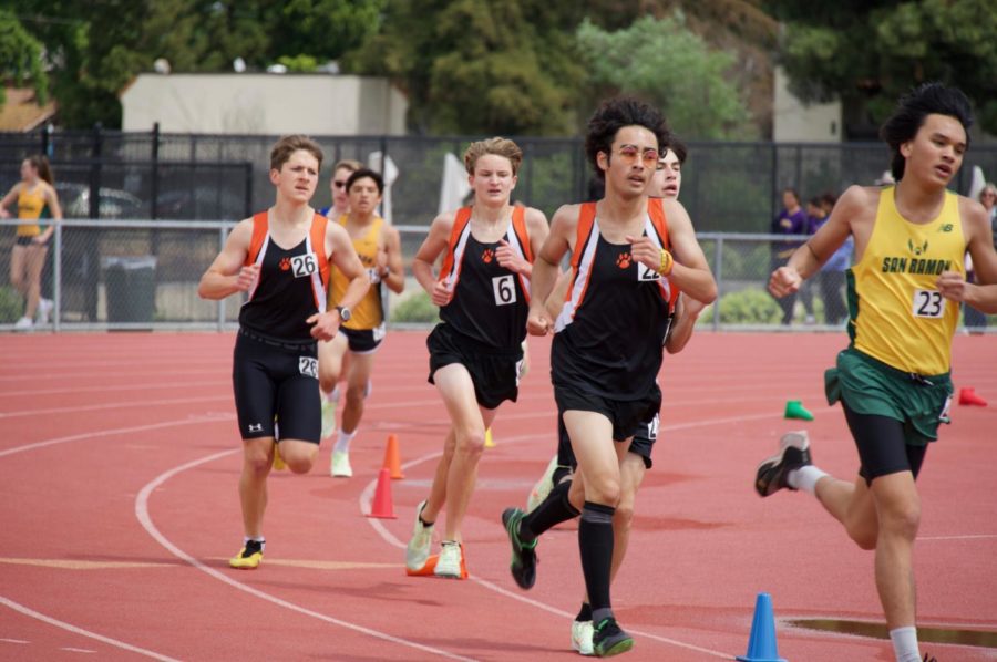 Senior Kai Steiner, Freshmen Jude Bowen, and Sophomore Dominic Barty leading the 1600 meter race. 