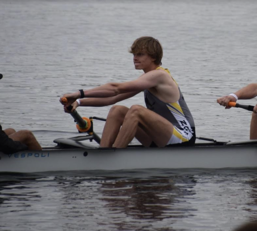Kreidler competes on an eight-person team with each individual utilizing one oar.