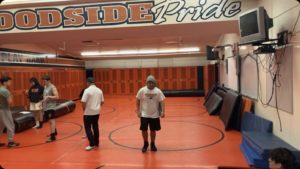 Wrestlers at Woodside spend a large fraction of their practice in the mat room, where they work on wrestling techniques and wrestle each other.