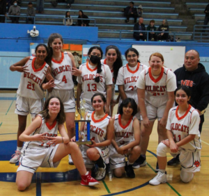 JV Girls Basketball Team with their trophy after winning the Jefferson HS tournament.