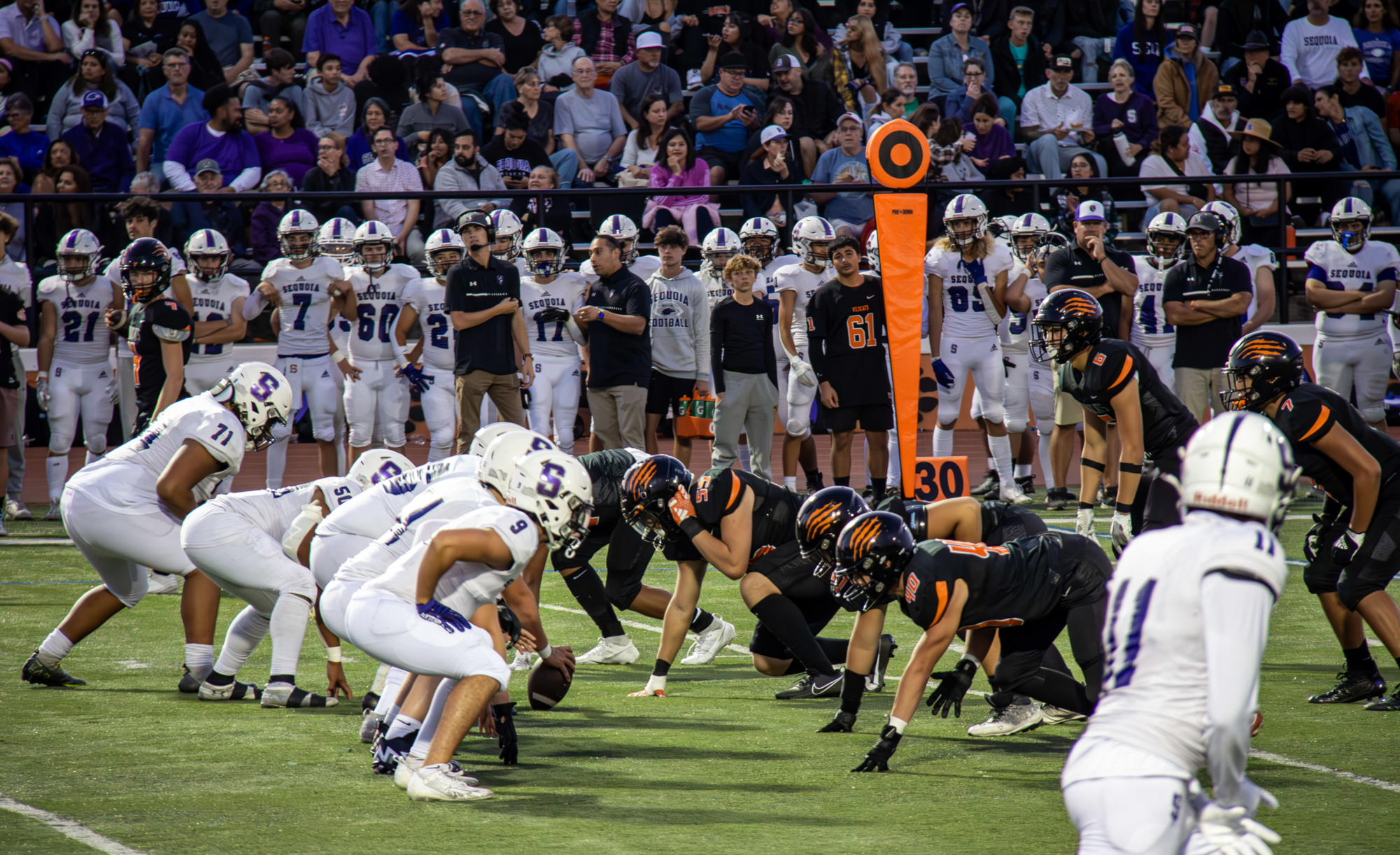 Woodside and Sequoia line up for a down during the heated rivalry.