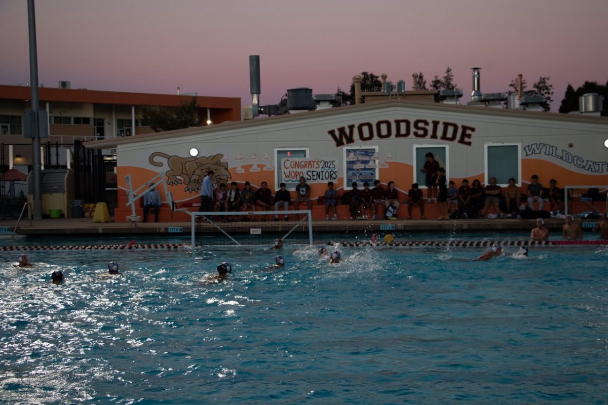 Sunset over Woodside pool during the boys water polo game against Menlo Atherton.