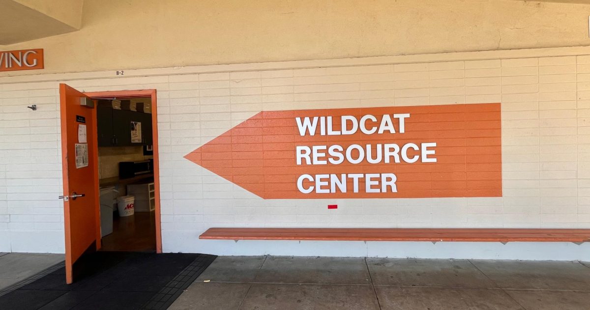 Right next to classroom B-2 stands a large sign pointing into Lopez's classroom.