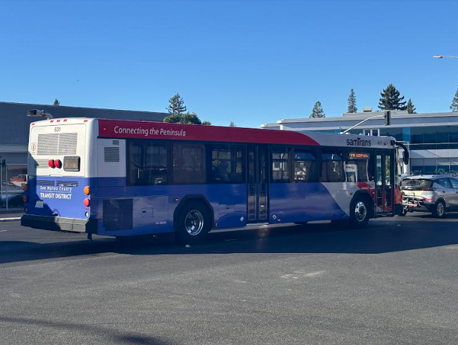 SamTrans bus on Woodside Road in Redwood City continues its normal route after disruptions with the SamTrans die down.