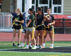 The girls JV flag football team practicing on the new Bradley Field.