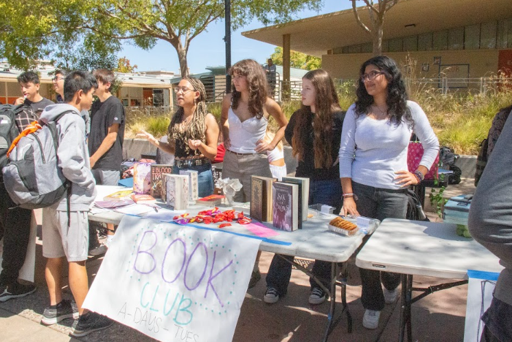 Book club's table presented at club rush for new members.