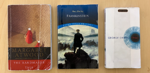 Three of the speculative fiction books featured in Woodside’s English curriculum.