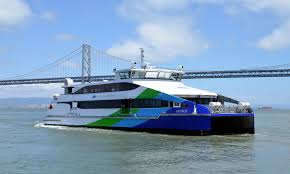 A San Francisco Bay Ferry in front of the Bay Bridge.