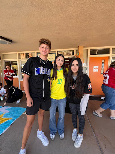 Grace Carruba, Aaron Wilson, and Marycarla Germano participating in Tuesday, Oct. 22nd’s theme of the spirit week, Jersey Day.