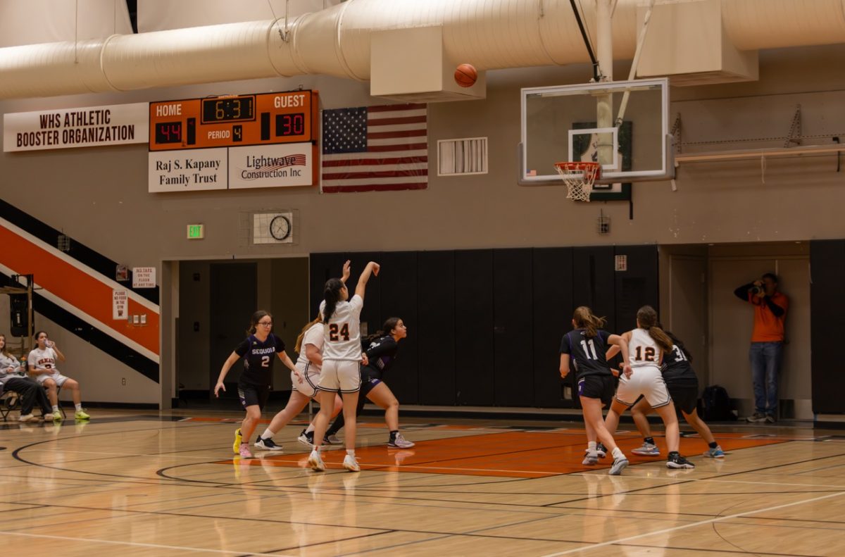 Woodside girls shot a free throw during their home game against Sequoia.