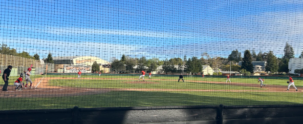 The JV boys baseball team wins their first game of the season.