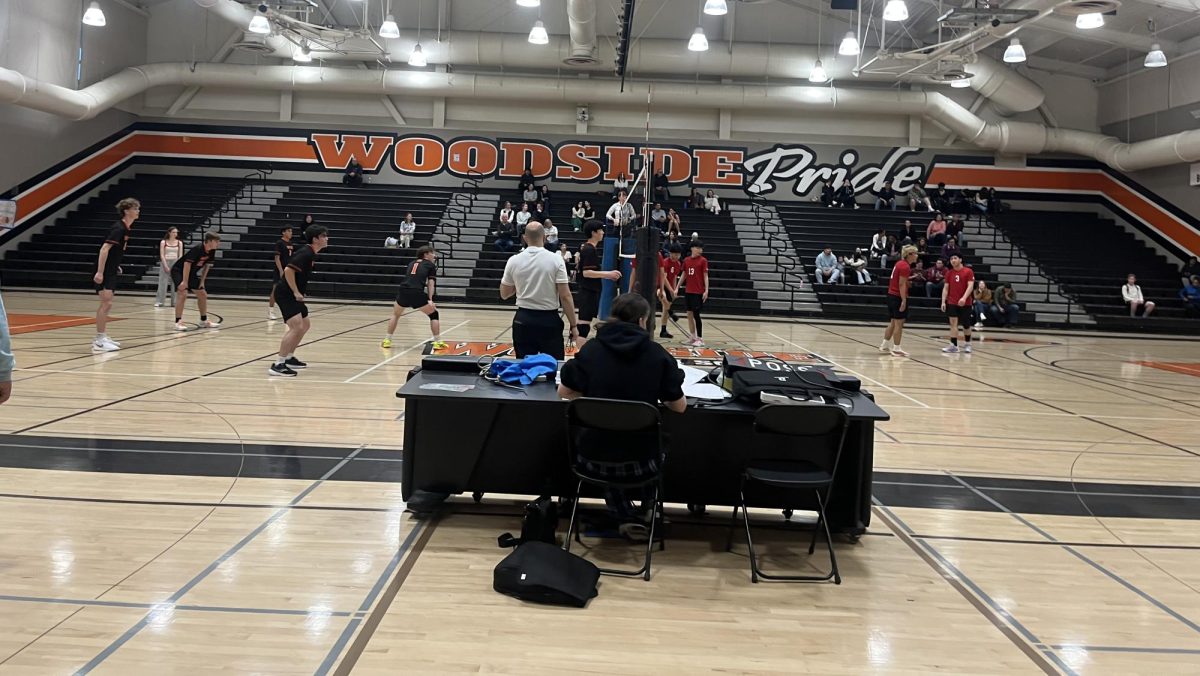  Woodside getting ready as the opponent goes back to serve 
