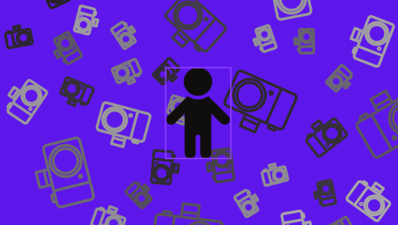Child surrounded by cameras, having their every move closely recorded.