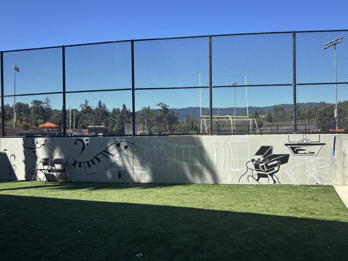 Current progress on the I-wing mural along the I-wing lawn.