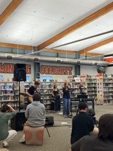 199 Records performs the "Tiny Desk" concert in front of a crowd of Woodside students.