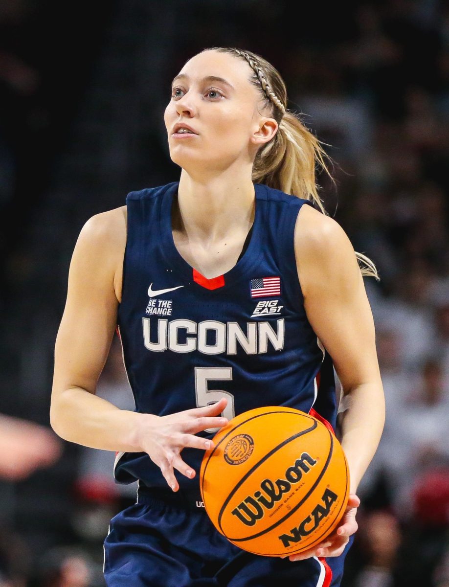 Uconn Women’s basketball player, Paige Bueckers prepares to shoot a shot against South Carolina 



