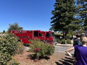 Students walk back to class after the unplanned fire evacuation drill on Monday, Sept. 15