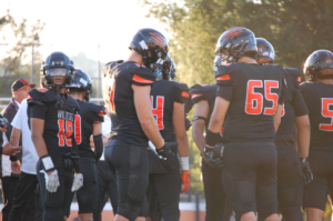 Woodside's first home game of the season with the theme “Back in Black.”