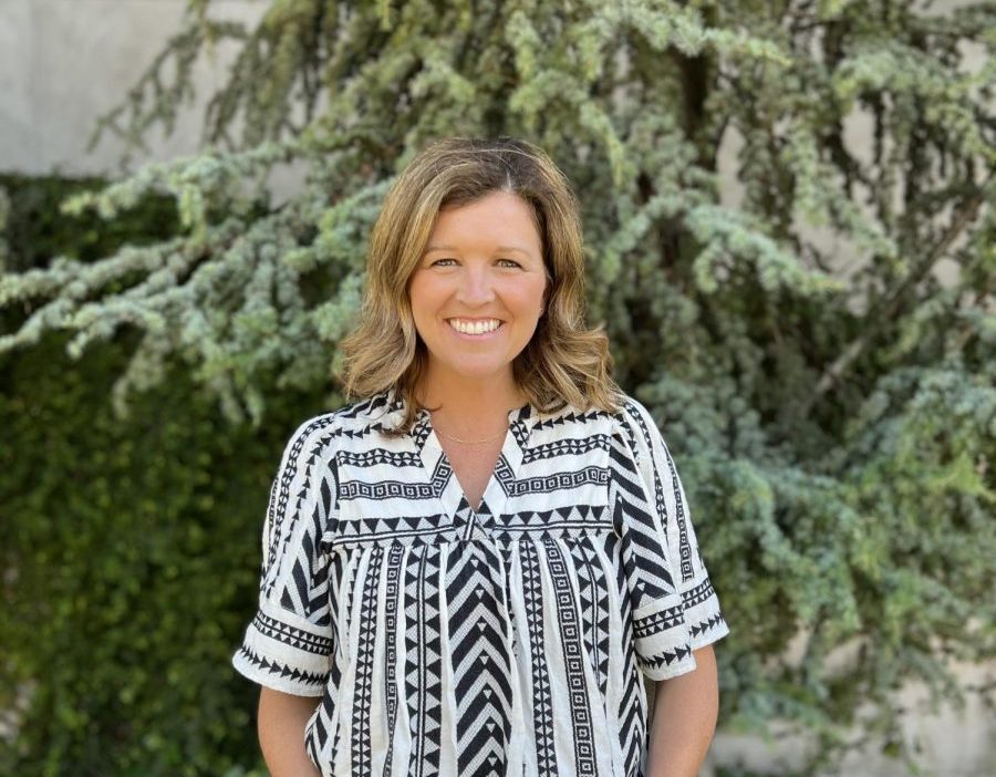 Photo taken of Amy Hanson in a nature filled background.