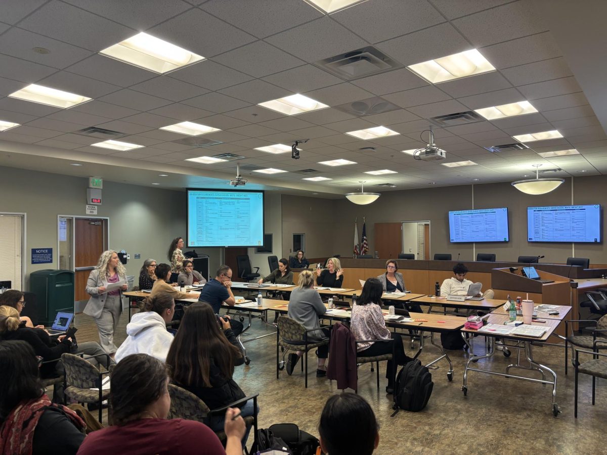 The Sequoia Union High School District board sat around tables facing each other instead of their usual panel layout.
