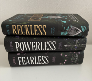 All books from Lauren Robert's Powerless trilogy, popular among young adult readers.